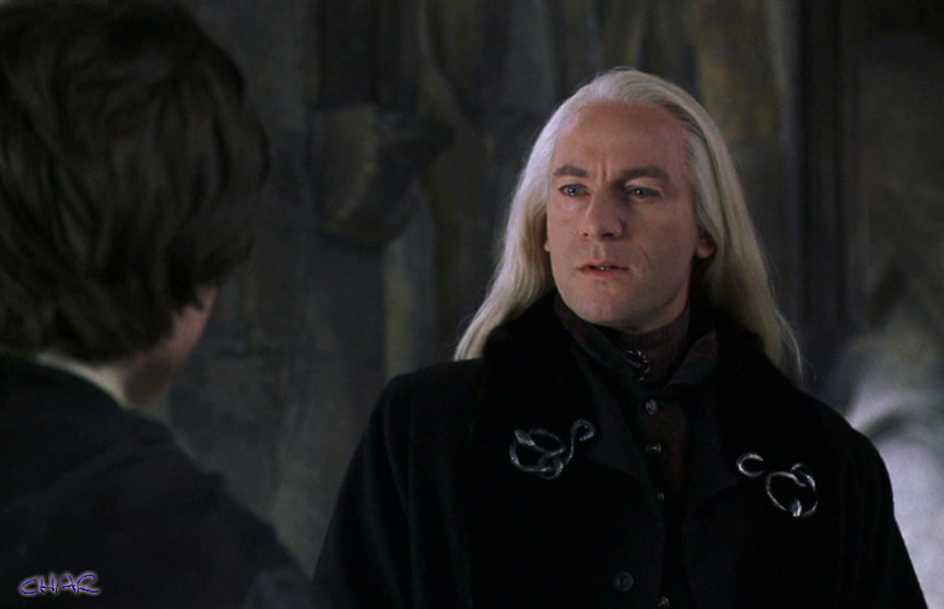 Lucius Malfoy looking at harry potter