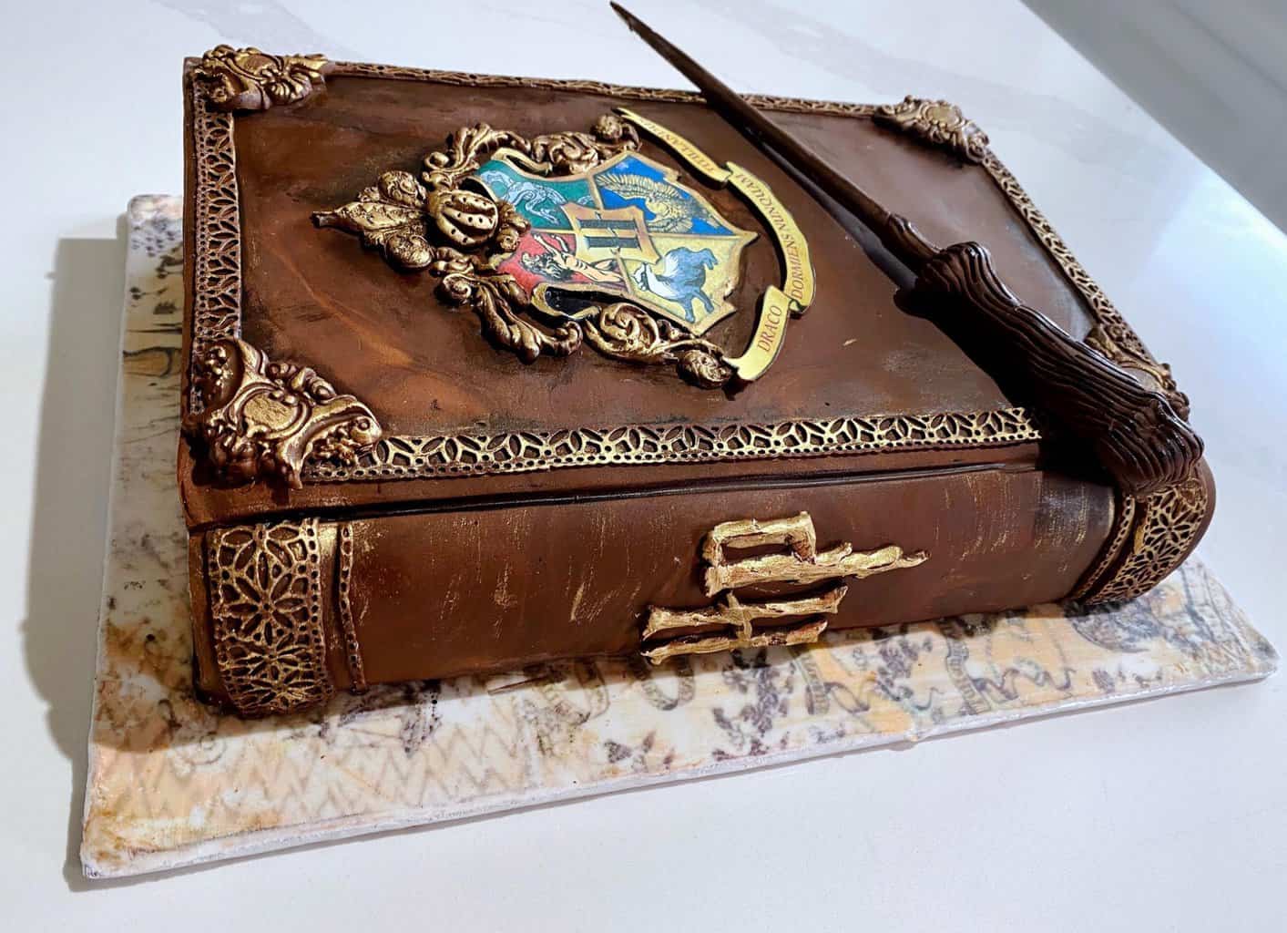 Cake With A Harry Potter Book And Wand